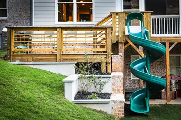 Outdoor makeover: Kid-Friendly-Backyards-Slide-Built-Into-Hill